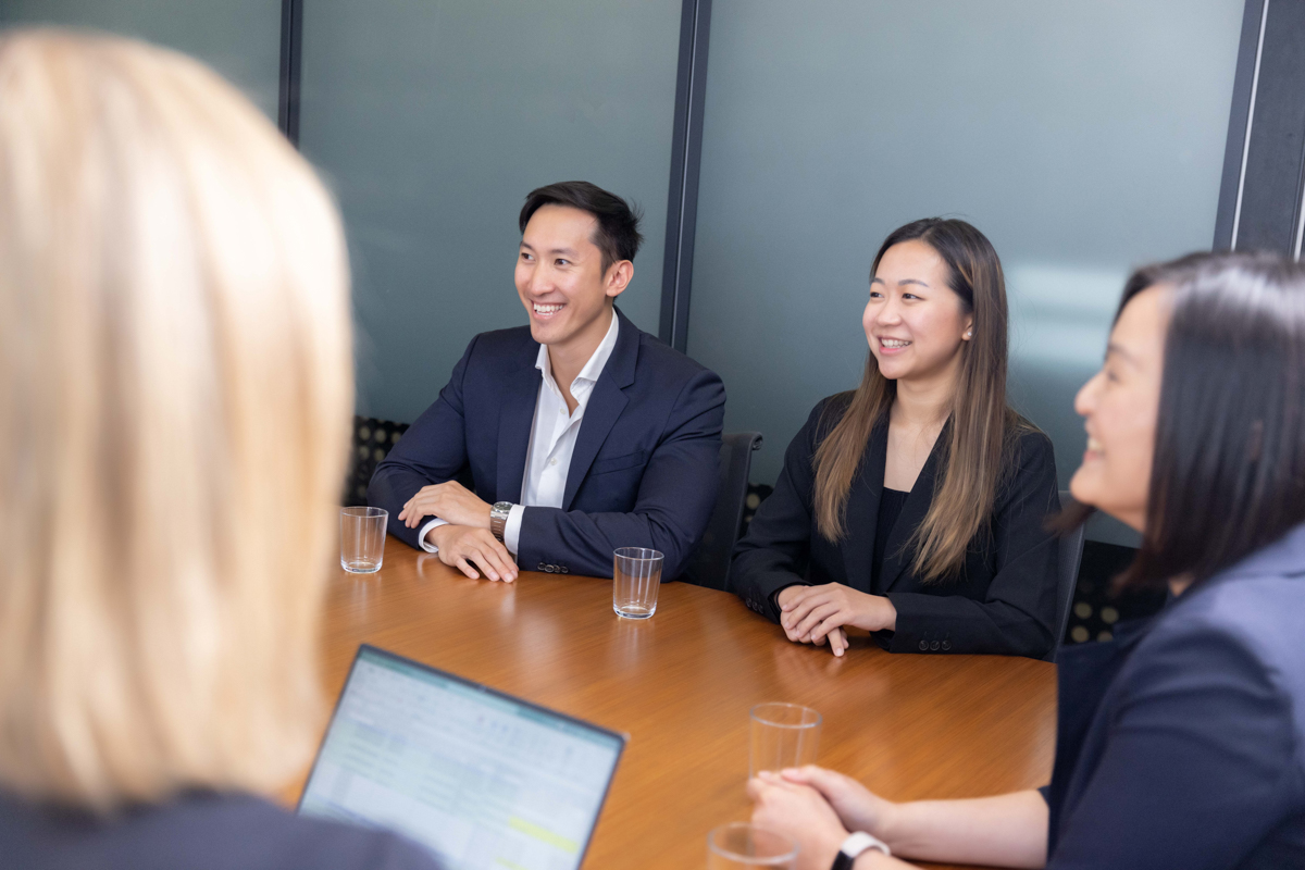 Aura Group Australian venture capital and operations team sitting together during a meeting