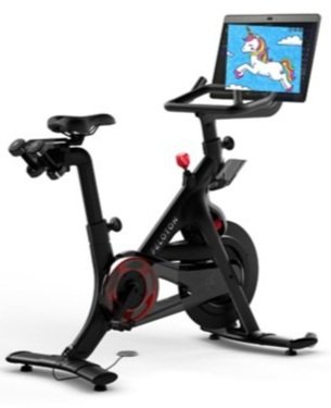 Peloton machine with an animated unicorn on the screen
